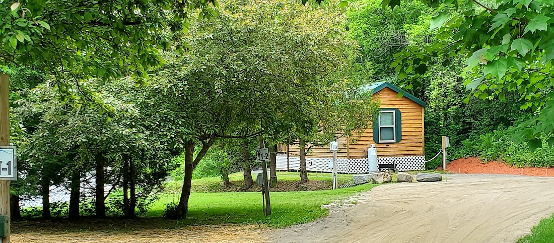 Riverside cabin site